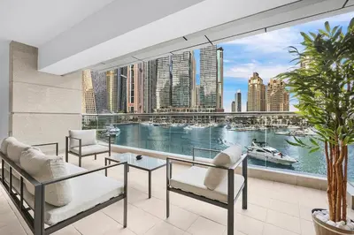 a living room with a view of the city at FIRST CLASS 1BR Inviting Marina Views in Dubai