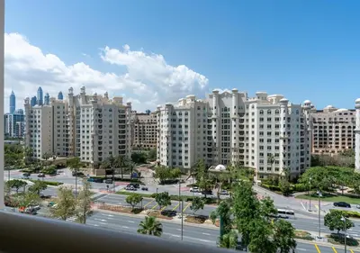 a view of a large city with tall buildings at Bespoke Holiday Homes - 2BR Apartment with Riva Beach Club Access, Al Nabat in Dubai