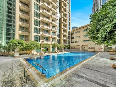 an image of a swimming pool in a building at Stylish 1BR - Burj Khalifa View in Dubai