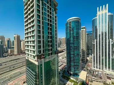 a view of a city with tall buildings at Higuest - Lake-view Studio in JLT in Dubai