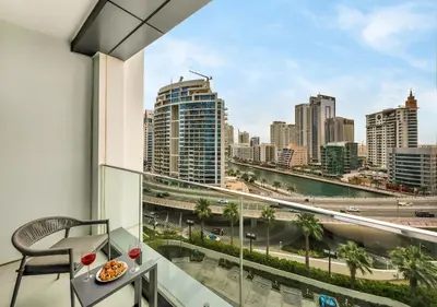a balcony with a view of a city skyline at Address Residences Stay in Dubai