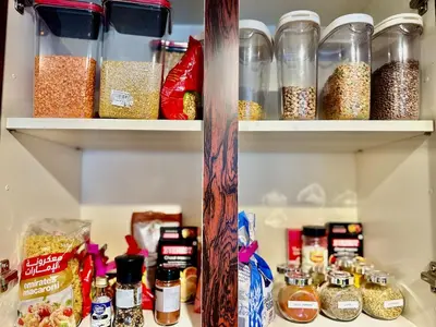a refrigerator filled with lots of different types of food at Dubai I Burj Residence Retreat I Piano & Workstation in Dubai