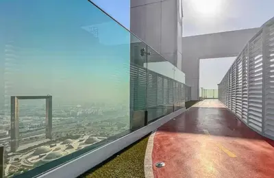 a building with a view of a city at Luxury 1 Bed in the heart of the city! Free WiFi in Dubai