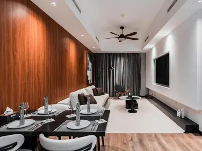 a living room with a couch and a table at D Stays holiday homes 1min walk to Dubai mall & Burj Khalifa in Dubai