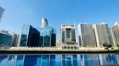 a group of tall buildings in a city at AWS Holiday Homes - Top Retreat near the Burj in Dubai