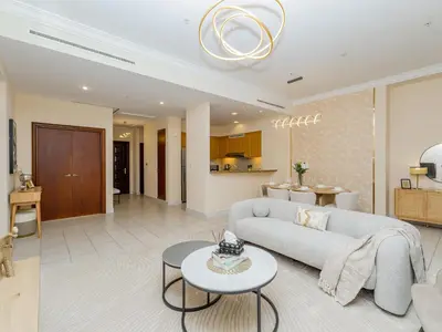 a living room with a couch and a table at Exclusive 2BR in Al Yass Tower Dubai Marina - Private Terrace & Premium Community, Managed by Think Realty in Dubai