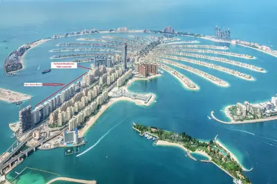 an aerial view of a city with a marina at New Fairmont Residence Private Beach club access Palm Jumeirah in Dubai