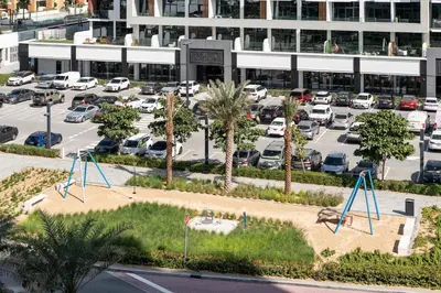an aerial view of a parking lot with cars at Luxury Meydan Studio Near Dubai Mall & Downtown in Dubai