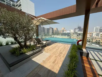 a balcony with a view of a city at Exquisitely designed studio in Oxford terraces JVC in Dubai