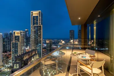 a room with a view of a city skyline at Ultimate Stay Luxurious Address Opera 2BR Next to Burj Khalifa and Dubai Mall Large Balcony with Stunning Views in Dubai