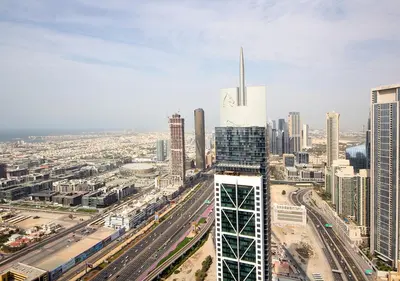 an aerial view of a city with buildings at Opulent 2BR In Paramount Hotel Apt in Dubai
