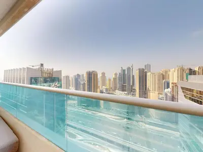 a view of a city from the balcony of a building at Spacious Duplex 4BR with Maids Room in Dubai