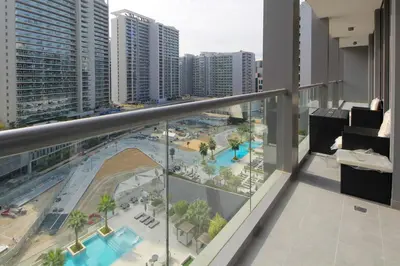 a balcony with a view of a city at Luxury 2BHK Plus Maid's Room The Sterling West Near Dubai Mall in Dubai