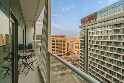 a view from the balcony of a building at Elegant 1-BR with Sea View Seven Palm, Palm Jumeirah in Dubai