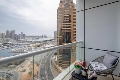 a balcony with a view of a city at Frank Porter - Botanica Tower in Dubai