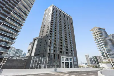 a tall building in a city with tall buildings at Silkhaus Highfloor 1BDR in 15 Northside Tower in Dubai