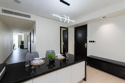 a dining room with a table and chairs at Address Dubai Marina, Dubai Marina - Mint Stay in Dubai