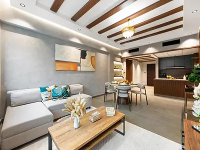 a living room with a couch and a table at Luxury Apartment In the Heart of Dubai Marina in Dubai