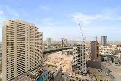 an aerial view of a city with tall buildings at FIRST CLASS Studio Luxe Cozy Living in Dubai