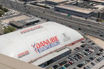 an aerial view of a dana impulse signs inc building at Aykon City Panoramic Skyline View in Dubai
