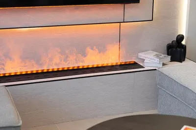 a wall mounted fireplace in a living room at Elegant 4BR Villa, Bali Pool Retreat, Ruba, A Ranches 3 in Dubai