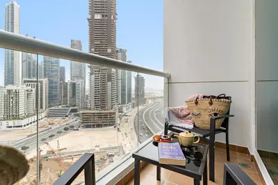 a balcony with a view of a city at Central Downtown Studio by Burj Khalifa & Mall in Dubai