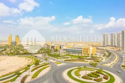 an aerial view of the city of dubai at Bloomfields Stylish 1br Orchid Residence in Dubai