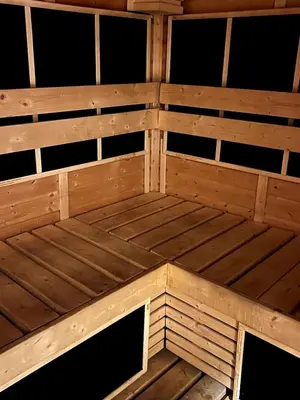 a wooden bunk bed in a wooden cabin at The Designers Apartment Dubai Marina in Dubai