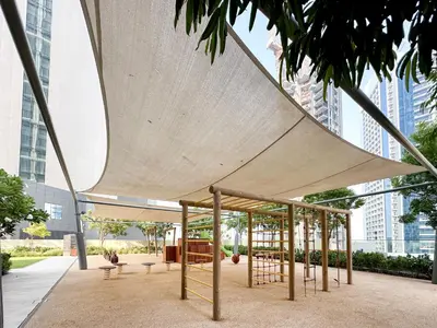 a pavilion with awning in a city with tall buildings at Spectacular Burj Khalifa View, 2BR Luxury Apartment by SBH in Dubai