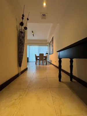 a living room with a table and a pool table at Click Stay - JLT - 2 Bedroom & Balcony Lakes View Entire Apartment -SS in Dubai