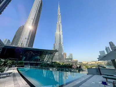 a view of the shard from the rooftop of a building at Luxury 3BR Apartment with Burj Khalifa Views in Dubai