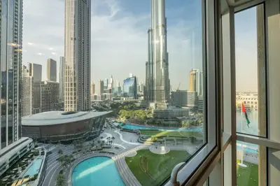 a view from a window of a city at 2-Bedroom Apartment with Full Burj Khalifa & Opera House Views Just 9 Min Walk to Dubai Mall! in Dubai