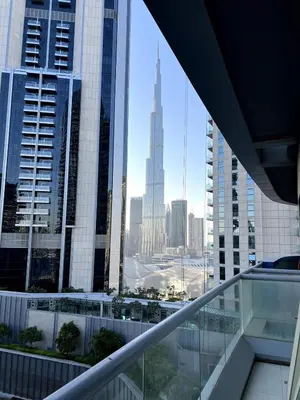 a view of the burj khalifa from a building at 1 BR in Mall St in Dubai