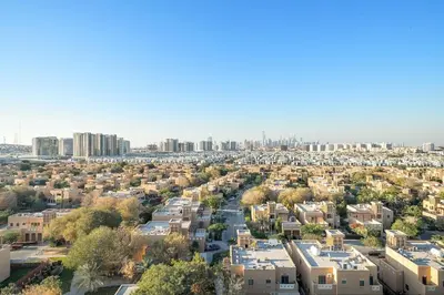 an aerial view of a city with buildings at FIRST CLASS 1BR Stylish Urban Retreat in Dubai