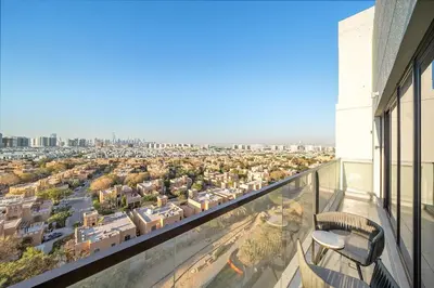 a view of a city from the balcony of a building at FIRST CLASS 1BR Stylish Urban Retreat in Dubai