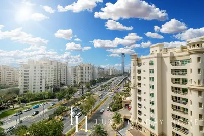 a view of a street in a city with buildings at LUX The Shoreline Palm Island Skyline Suite 2 in Dubai