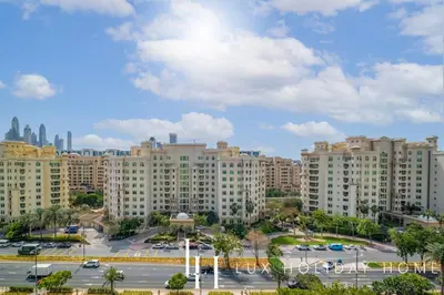 an aerial view of a city with tall buildings at LUX The Shoreline Palm Island Skyline Suite 2 in Dubai