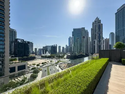 a view of a city skyline from a balcony at Modern 1BR in DOWNTOWN I Near DUBAI MALL & FOUNTAIN in Dubai