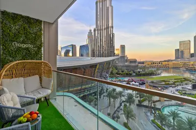 a balcony with a view of a city at Gogoto2 Lux Burj Khalifa View 5 min Dubai Mall PS5 NYE Fireworks View in Dubai