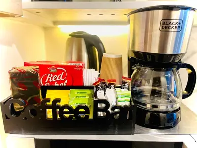 a blender sitting on top of a counter at Azizi Rivieira Meydan, Dubai Luxury Studio with Burjkhalifa and Pool views in Dubai