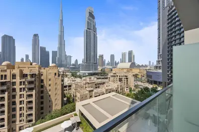 a view of the city from the balcony of a building at Walk to Dubai Mall- Enjoy Burj Khalifa Show in Dubai
