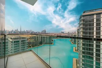 a view of a river in a city with buildings at Luxury 2 Bedroom plus kids room Burj Khalifa View in Dubai