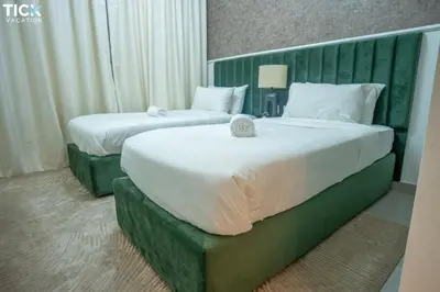 two beds in a hotel room with two at 2BR Luxury Apartment Forte 2 Downtown 14th Floor in Dubai