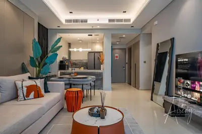 a living room with a couch and a table at Stylish 2BRUrban Retreat 10 Min to Burj Khalifa in Dubai