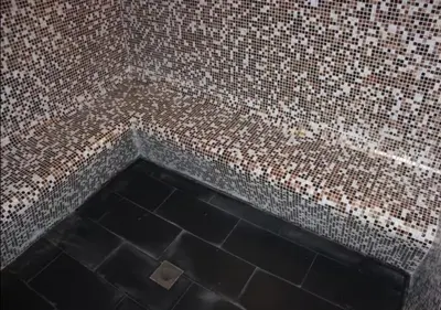a tiled shower with aificialificialificialificialificialificialificialificialificialificial at Well located Studio on 9 floor Sky View Tower in Dubai