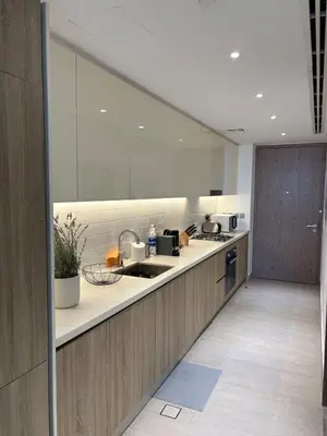 a kitchen with a sink and a counter at Luxury Sea View Studio in Dubai Marina in Dubai
