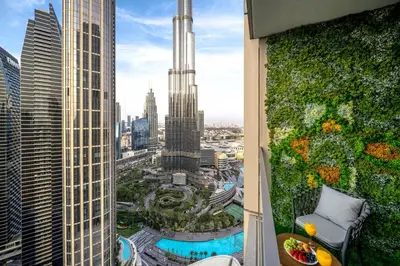 a view of the city from a skyscraper at Luxe Living at Grande Signature - Burj Khalifa and Sea Views - Brand New in Dubai