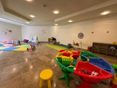a room filled with lots of different types of toys at ASHRI Stylish African-Inspired Studio in DIFC in Dubai