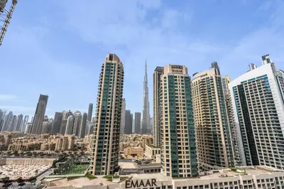 a group of tall buildings in a city at New Luxury 1BR Apart Business Bay with Balcony in Dubai