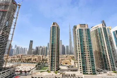 a group of tall buildings in a city at New Luxury 1BR Apart Business Bay with Balcony in Dubai